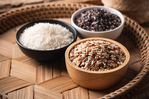 Comparison of different rice varieties including Thai Hom Mali, Brown, and Red rice, available to buy rice online at PSC Corp Singapore.